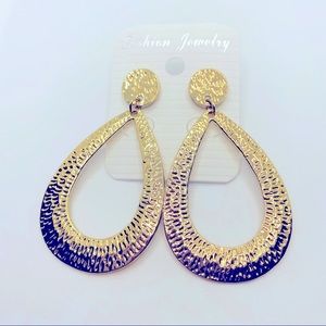 Earrings golden hammered look Pierced. So Pretty